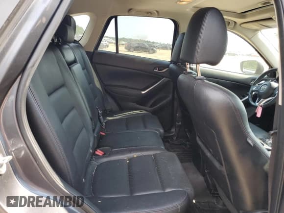 ✅ 2016 Mazda CX-5 Grand Touring • VIN: JM3KE2DY0G0850105 • Lot: 69781115. Listed on Copart with 86,615 mi. Free auction sales archive from the USA and detailed vehicle history report at DreamBid. Image 11.