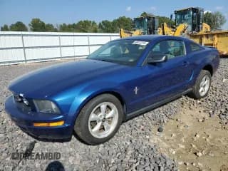 ✅ 2007 Ford Mustang Deluxe • VIN: 1ZVFT80N775234030 • Lot: 86512215. Listed on Copart with 104,228 mi. Free auction sales archive from the USA and detailed vehicle history report at DreamBid. Image 1.