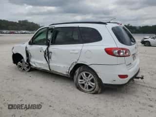 2012 Hyundai Santa Fe GLS с VIN 5XYZG3AB6CG157258, выставлен на аукционе Copart как лот 54052354 с пробегом 223 325 миль миль и На запчасти • Non repairable. История ставок и продаж доступна на DreamBid. Изображение 2.