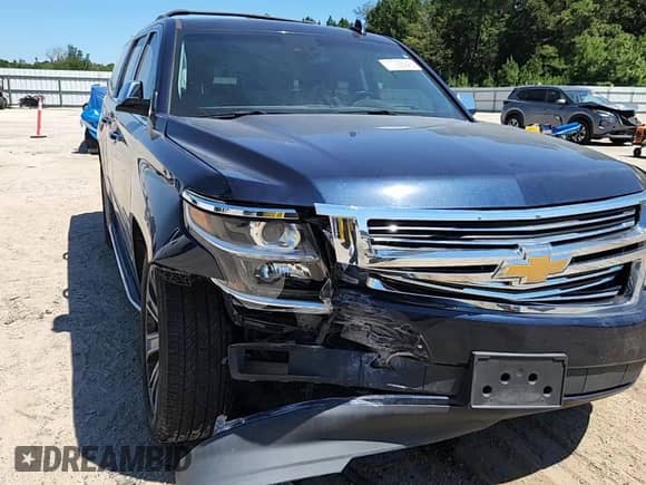 2019 Chevrolet Suburban Premier with VIN 1GNSCJKCXKR110511, listed as a Copart auction lot 71028945 with 87,669 mi miles and Salvage title. Bid and sale history available at DreamBid. Image 14.