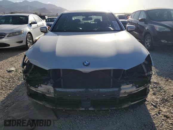 ✅ 2017 BMW 7 Series 740i • VIN: WBA7E2C30HG740990 • Lot: 67099225. Listed on Copart with 102,873 mi. Free auction sales archive from the USA and detailed vehicle history report at DreamBid. Image 5.