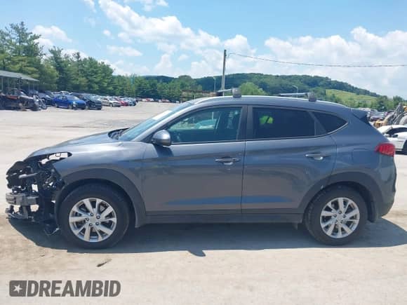 2019 Hyundai Tucson Value with VIN KM8J33A46KU052965, listed as a IAAI auction lot 42662016 with 115,861 mi miles and . Bid and sale history available at DreamBid. Image 15.