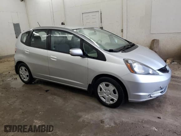 ✅ 2012 Honda Fit • VIN: JHMGE8H30CC028475 • Lot: 90080035. Listed on Copart with 129,276 mi. Free auction sales archive from the USA and detailed vehicle history report at DreamBid. Image 4.