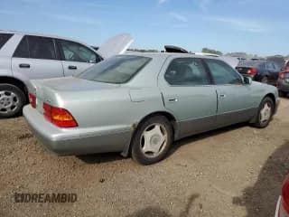 ✅ 1999 Lexus LS 400 • VIN: JT8BH28F0X0150236 • Лот: 68174374. Опубликован ранее на Copart с пробегом 266 293 миль. Бесплатный доступ к архиву аукционных продаж из США и подробный отчёт об истории автомобиля на DreamBid. Изображение 3.