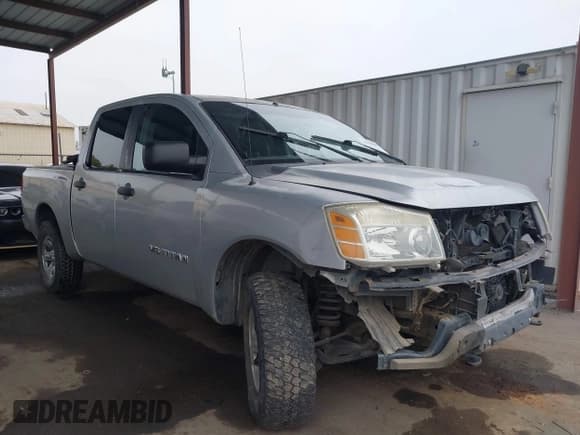 ✅ 2005 Nissan Titan SE • VIN: 1N6AA07BX5N506077 • Lot: 43799695. Listed on IAAI with 210,025 mi. Free auction sales archive from the USA and detailed vehicle history report at DreamBid. Image 1.
