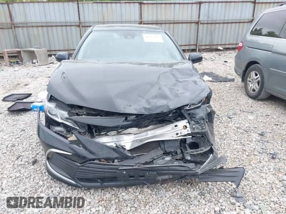 2021 Toyota Camry LE z VIN 4T1C11BK7MU036762, wystawiony jako IAAI lot #42247569 z przebiegiem Nie podano mil oraz . Historia ofert i sprzedaży dostępna na DreamBid. Obrazek 13.