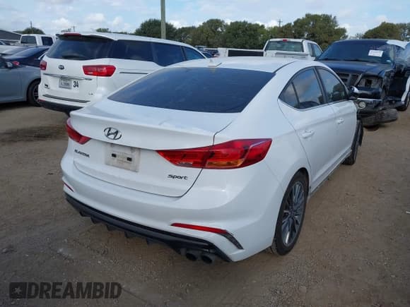 ✅ 2018 Hyundai Elantra Sport • VIN: KMHD04LB3JU456943 • Lot: 43374044. Listed on IAAI with 146,684 mi. Free auction sales archive from the USA and detailed vehicle history report at DreamBid. Image 4.