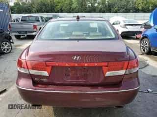 2009 Hyundai Azera GLS z VIN KMHFC46D19A358682, wystawiony jako Copart lot #65164534 z przebiegiem 168 592 mil mil oraz Szkoda całkowita • Salvage title. Historia ofert i sprzedaży dostępna na DreamBid. Obrazek 6.