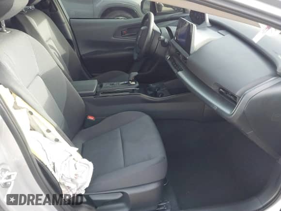 2025 Toyota Prius LE with VIN JTDACAAU4S3052719, listed as a IAAI auction lot 43175096 with 23,082 mi miles and . Bid and sale history available at DreamBid. Image 5.