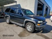 ✅ 2003 Chevrolet Tahoe Commercial • VIN: 1GNEK13ZX3R277987 • Lot: 94215075. Listed on Copart with 150,715 mi. Free auction sales archive from the USA and detailed vehicle history report at DreamBid. Image 4.