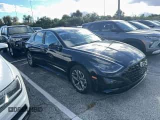 2023 Hyundai Sonata SEL с VIN KMHL64JA1PA303072, выставлен на аукционе Copart как лот 91112995 с пробегом 21 733 миль миль и Чистый • Clean title. История ставок и продаж доступна на DreamBid. Изображение 1.