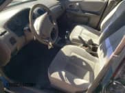 ✅ 1999 Mazda Protege DX • VIN: JM1BJ2226X0182555 • Lot: 71795515. Wystawiony na Copart z przebiegiem 199 035 mil. Bezpłatny archiwum sprzedaży aukcyjnych z USA i szczegółowy raport historii pojazdu na DreamBid. Zdjęcie 7.