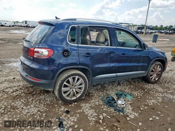 ✅ 2014 Volkswagen Tiguan S • VIN: WVGAV3AX7EW602185 • Lot: 70879275. Listed on Copart with 146,420 mi. Free auction sales archive from the USA and detailed vehicle history report at DreamBid. Image 3.