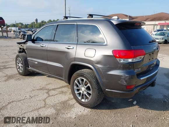 ✅ 2014 Jeep Grand Cherokee Overland • VIN: 1C4RJFCM0EC338798 • Lot: 43257111. Listed on IAAI with 177,271 mi. Free auction sales archive from the USA and detailed vehicle history report at DreamBid. Image 3.
