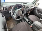 ✅ 2016 Jeep Wrangler Black Bear • VIN: 1C4AJWAG0GL104173 • Lot: 63565415. Wystawiony na Copart z przebiegiem 52 922 mil. Bezpłatny archiwum sprzedaży aukcyjnych z USA i szczegółowy raport historii pojazdu na DreamBid. Zdjęcie 8.