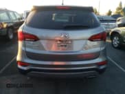 ✅ 2018 Hyundai Santa Fe 2.4L • VIN: 5XYZT3LB0JG541252 • Лот: 71898762. Опубликован ранее на Copart с пробегом 104 475 миль. Бесплатный доступ к архиву аукционных продаж из США и подробный отчёт об истории автомобиля на DreamBid. Изображение 6.