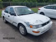 ✅ 1993 Toyota Corolla • VIN: 1NXAE04E9PZ113388 • Lot: 42556633. Listed on IAAI with 130,024 mi. Free auction sales archive from the USA and detailed vehicle history report at DreamBid. Image 1.