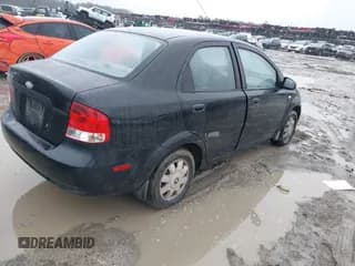 ✅ 2005 Chevrolet Aveo LT • VIN: KL1TG52605B480079 • Lot: 41757862. Wystawiony na IAAI z przebiegiem 163 561 mil. Bezpłatny archiwum sprzedaży aukcyjnych z USA i szczegółowy raport historii pojazdu na DreamBid. Zdjęcie 4.