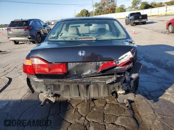 2000 Honda Accord EX с VIN 1HGCG1651YA094494, выставлен на аукционе Copart как лот 86269555 с пробегом 100 293 миль миль и Списание • Salvage title. История ставок и продаж доступна на DreamBid. Изображение 6.