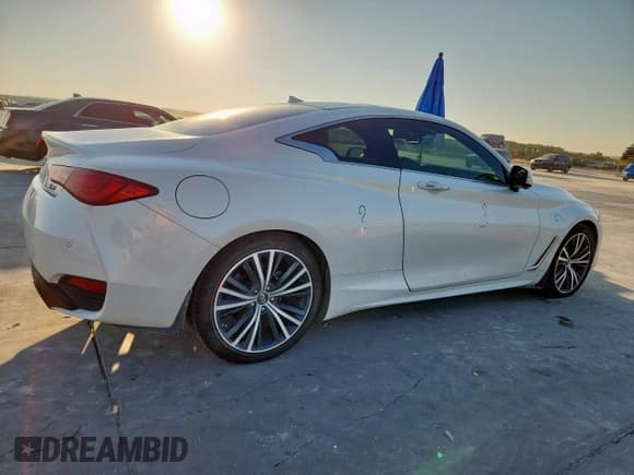 ✅ 2022 Infiniti Q60 Luxe • VIN: JN1EV7KK2NM600732 • Лот: 85740365. Опубликован ранее на Copart с пробегом 33 877 миль. Бесплатный доступ к архиву аукционных продаж из США и подробный отчёт об истории автомобиля на DreamBid. Изображение 3.