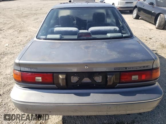 ✅ 1990 Toyota Corolla • VIN: JT2AE96J0L3382052 • Lot: 57894754. Listed on Copart with 90,550 mi. Free auction sales archive from the USA and detailed vehicle history report at DreamBid. Image 6.