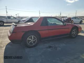 ✅ 1986 Pontiac Fiero • VIN: 1G2PF379XGP215474 • Lot: 73346514. Wystawiony na Copart z przebiegiem 71 955 mil. Bezpłatny archiwum sprzedaży aukcyjnych z USA i szczegółowy raport historii pojazdu na DreamBid. Zdjęcie 3.