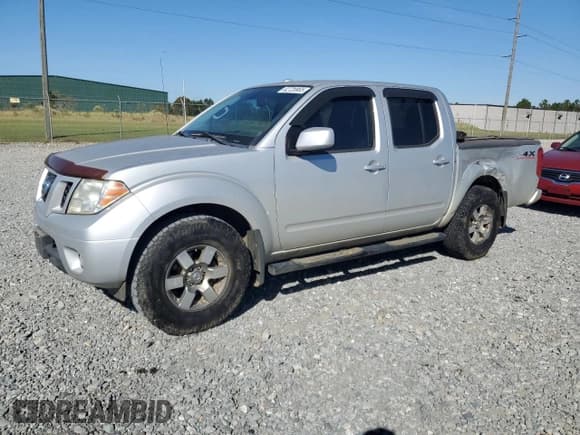 ✅ 2012 Nissan Frontier Pro-4X • VIN: 1N6AD0EV9CC460125 • Lot: 82728965. Listed on Copart with 183,465 mi. Free auction sales archive from the USA and detailed vehicle history report at DreamBid. Image 1.