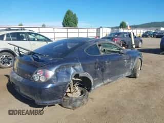 2005 Hyundai Tiburon GT с VIN KMHHN65F65U167737, выставлен на аукционе IAAI как лот 42776961 с пробегом 189 846 миль миль и . История ставок и продаж доступна на DreamBid. Изображение 4.