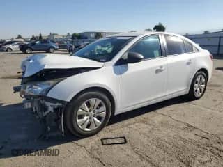 2016 Chevrolet Cruze LS with VIN 1G1PC5SG4G7148322, listed as a Copart auction lot 71701995 with 74,752 mi miles and Salvage title. Bid and sale history available at DreamBid. Image 1.