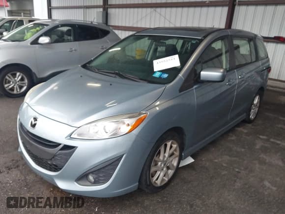 ✅ 2012 Mazda 5 Touring • VIN: JM1CW2CL1C0131939 • Lot: 43552511. Listed on IAAI with 171,138 mi. Free auction sales archive from the USA and detailed vehicle history report at DreamBid. Image 2.