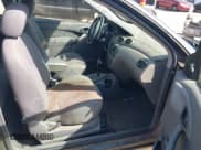 ✅ 2004 Ford Focus ZX3 • VIN: 3FAFP31304R127536 • Лот: 42260325. Опубликован ранее на IAAI с пробегом 80 016 миль. Бесплатный доступ к архиву аукционных продаж из США и подробный отчёт об истории автомобиля на DreamBid. Изображение 5.