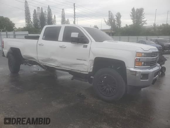 ✅ 2015 Chevrolet Silverado 2500HD LT • VIN: 1GC1CVE81FF100234 • Lot: 69316554. Listed on Copart with 195,795 mi. Free auction sales archive from the USA and detailed vehicle history report at DreamBid. Image 4.