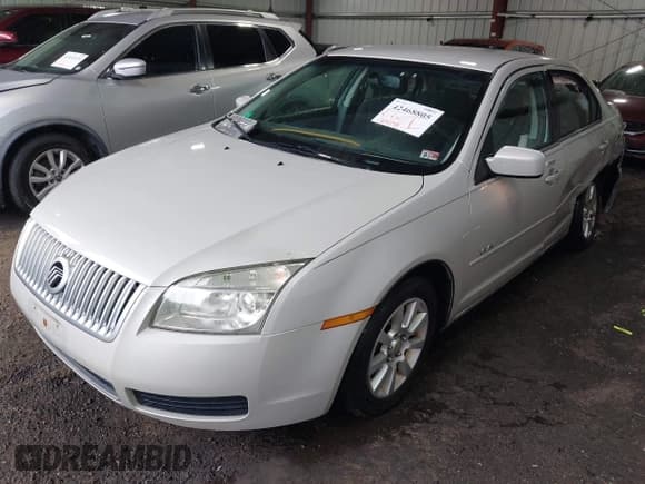 ✅ 2008 Mercury Milan • VIN: 3MEHM07Z38R663276 • Lot: 42468805. Listed on IAAI with 124,173 mi. Free auction sales archive from the USA and detailed vehicle history report at DreamBid. Image 2.