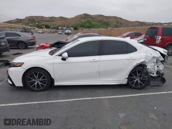 2023 Toyota Camry SE with VIN 4T1T11BK1PU077750, listed as a IAAI auction lot 42047470 with 51,015 mi miles and . Bid and sale history available at DreamBid. Image 14.