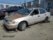 ✅ 1994 Toyota Corolla • VIN: 1NXAE04BXRZ180073 • Lot: 56080254. Wystawiony na Copart z przebiegiem 216 558 mil. Bezpłatny archiwum sprzedaży aukcyjnych z USA i szczegółowy raport historii pojazdu na DreamBid. Zdjęcie 1.