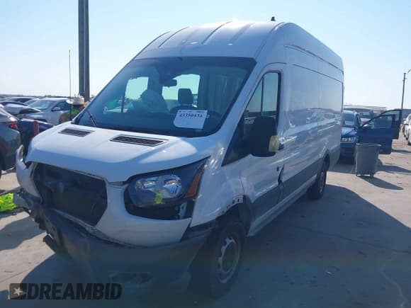 ✅ 2021 Ford Transit Cargo • VIN: 1FTBW3X88MKA61112 • Lot: 43350434. Wystawiony na IAAI z przebiegiem 57 141 mil. Bezpłatny archiwum sprzedaży aukcyjnych z USA i szczegółowy raport historii pojazdu na DreamBid. Zdjęcie 18.