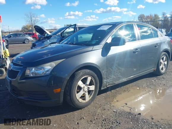 2013 Chevrolet Cruze 1LT с VIN 1G1PC5SB6D7184397, выставлен на аукционе IAAI как лот 43601539 с пробегом 164 464 миль миль и . История ставок и продаж доступна на DreamBid. Изображение 2.