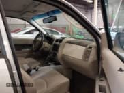 ✅ 2009 Mercury Mariner Premier • VIN: 4M2CU97799KJ18651 • Lot: 43508657. Wystawiony na IAAI z przebiegiem 150 261 mil. Bezpłatny archiwum sprzedaży aukcyjnych z USA i szczegółowy raport historii pojazdu na DreamBid. Zdjęcie 5.