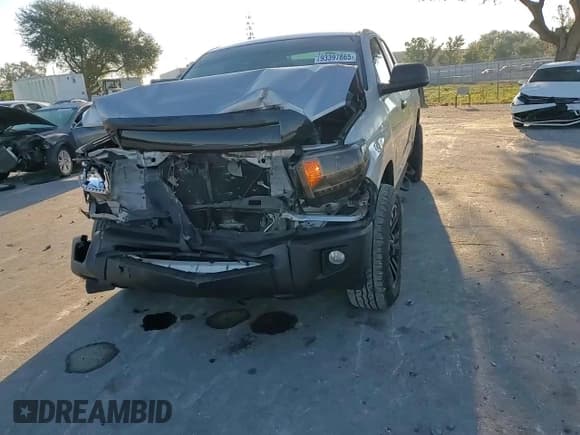 ✅ 2015 Toyota Tundra SR • VIN: 5TFRM5F13FX094321 • Lot: 93397865. Listed on Copart with 156,929 mi. Free auction sales archive from the USA and detailed vehicle history report at DreamBid. Image 13.
