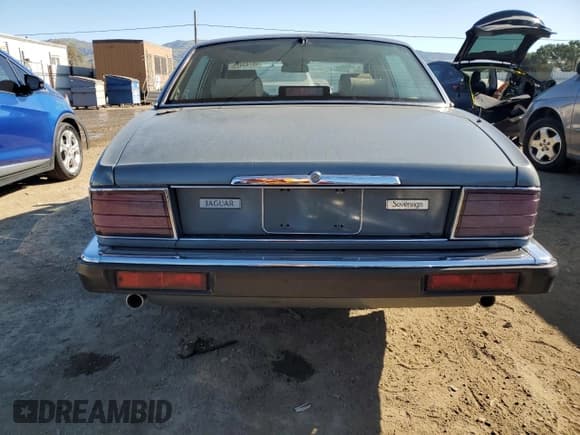 ✅ 1991 Jaguar XJ • VIN: SAJHY1748MC636987 • Lot: 46743425. Listed on Copart with 192,615 mi. Free auction sales archive from the USA and detailed vehicle history report at DreamBid. Image 6.