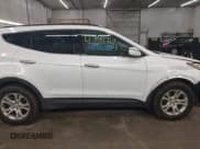 ✅ 2016 Hyundai Santa Fe • VIN: 5XYZUDLB5GG319835 • Лот: 43195919. Опубликован ранее на IAAI с пробегом 137 341 миль. Бесплатный доступ к архиву аукционных продаж из США и подробный отчёт об истории автомобиля на DreamBid. Изображение 14.