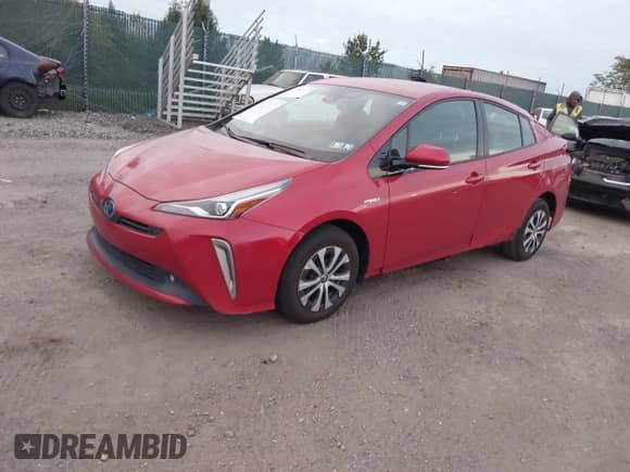 2019 Toyota Prius LE z VIN JTDL9RFU2K3011486, wystawiony jako IAAI lot #43567477 z przebiegiem 72 331 mil mil oraz . Historia ofert i sprzedaży dostępna na DreamBid. Obrazek 2.