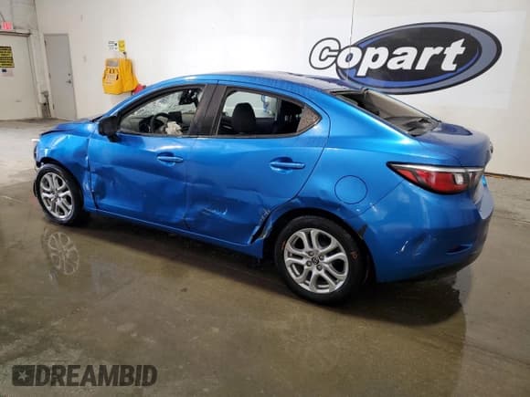 ✅ 2017 Toyota Yaris • VIN: 3MYDLBYVXHY156733 • Lot: 65355625. Listed on Copart with 90,039 mi. Free auction sales archive from the USA and detailed vehicle history report at DreamBid. Image 2.
