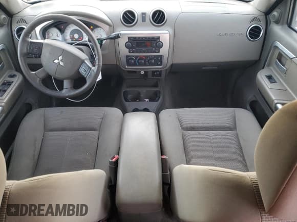 ✅ 2006 Mitsubishi Raider Duro Cross • VIN: 1Z7HT38N36S579031 • Lot: 87695435. Wystawiony na Copart z przebiegiem 117 098 mil. Bezpłatny archiwum sprzedaży aukcyjnych z USA i szczegółowy raport historii pojazdu na DreamBid. Zdjęcie 8.