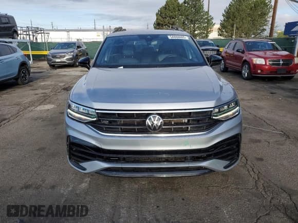 ✅ 2023 Volkswagen Tiguan SE R-Line Black • VIN: 3VVCB7AX9PM133697 • Лот: 54888605. Опубликован ранее на Copart с пробегом 21 294 миль. Бесплатный доступ к архиву аукционных продаж из США и подробный отчёт об истории автомобиля на DreamBid. Изображение 5.