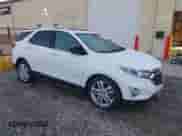 2020 Chevrolet Equinox Premier with VIN 3GNAXPEX7LS719569, listed as a IAAI auction lot 43479451 with 36,680 mi miles and . Bid and sale history available at DreamBid. Image 1.