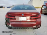 ✅ 2022 BMW 5 Series M550i xDrive • VIN: WBA13BK05NCJ29746 • Лот: 66611405. Опубликован ранее на Copart с пробегом 50 150 миль. Бесплатный доступ к архиву аукционных продаж из США и подробный отчёт об истории автомобиля на DreamBid. Изображение 6.