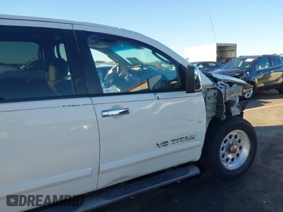✅ 2009 Nissan Titan LE • VIN: 1N6BA07D79N318614 • Lot: 43460475. Listed on IAAI with 232,157 mi. Free auction sales archive from the USA and detailed vehicle history report at DreamBid. Image 20.