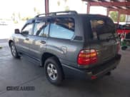 ✅ 1999 Toyota Land Cruiser • VIN: JT3HT05J1X0064266 • Lot: 42768432. Listed on IAAI with 246,931 mi. Free auction sales archive from the USA and detailed vehicle history report at DreamBid. Image 3.