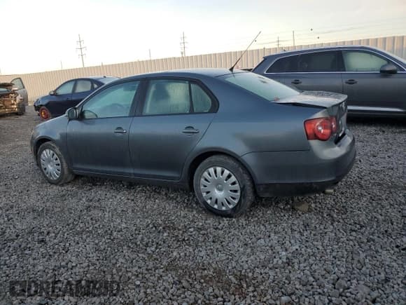 ✅ 2009 Volkswagen Jetta S • VIN: 3VWJM71K79M154049 • Lot: 90782995. Listed on Copart with 146,630 mi. Free auction sales archive from the USA and detailed vehicle history report at DreamBid. Image 2.